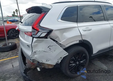 2023 Honda Cr-V Hybrid Sport Touring z USA, uszkodzony, nr VIN 5J6RS6H90PL009467